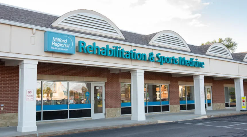 The "Rehabilitation and Sports Medicine" sign on the exterior of the building.