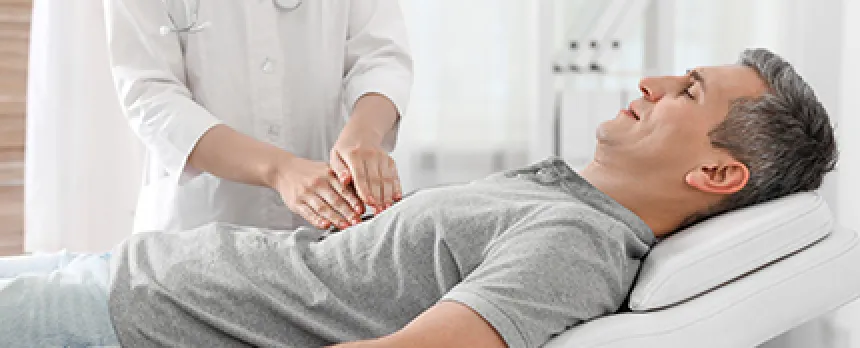 Image of patient on table being examined